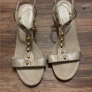 Gold Sandals with T-Strap and Ornate Embellishments